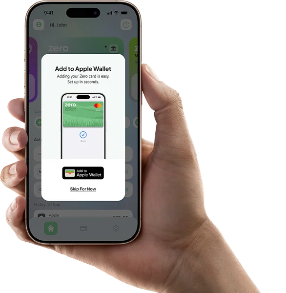 A photo of a hand holding a phone which shows the 'Add to Apple Wallet' prompt in the Zero app